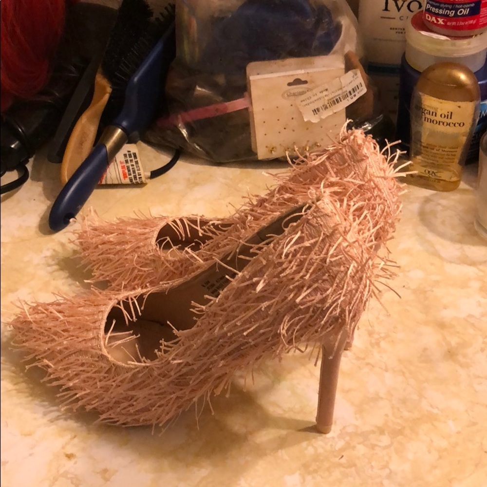 Pink heels with tassels